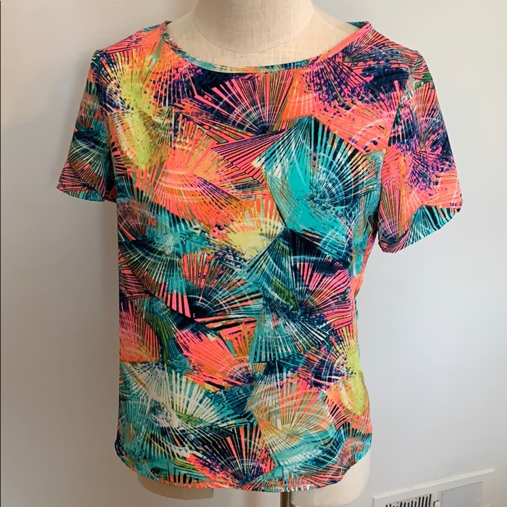 Multi colored short sleeve top with teal zipper